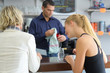 © auremar - girl friends at the bar of a cafeteria