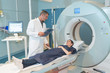 © auremar - female patient talking to doctor before mri scan