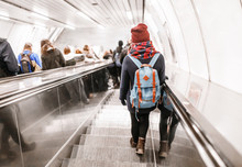 People Stand On The Escalator In The Metro Or Subway, The Concept Of Public Urban Underground Transport