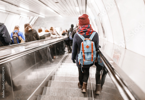 Cuadros en Lienzo People stand on the escalator in the metro or subway, the concept of public urba