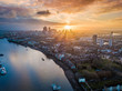 London, England - Panoramic aerial skyline view of east London at sunrise with skycrapers of Canary Wharf and beutiful colorful sky at background