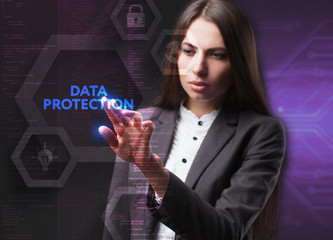 The concept of business, technology, the Internet and the network. A young entrepreneur working on a virtual screen of the future and sees the inscription: Data protection