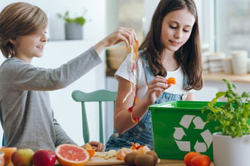 Girl throwing fruits waste