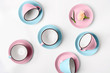 © Prostock-studio - Elegant porcelain blue and pink cups on abstract background