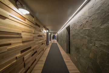 Wall Mural - corridor, hallway with wooden and brick wall in hotel