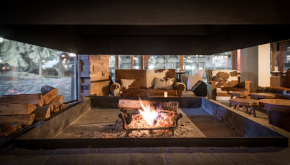 Wall Mural - view on through fireplace on restaurant interior
