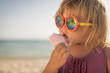 © poplasen - Girl eat icecream on summer holiday
