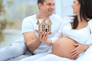 Wall Mural - closeup.Young happy couple dreaming about future home