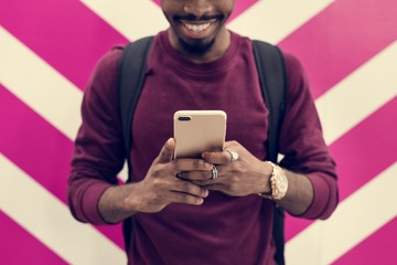 African man using mobile phone