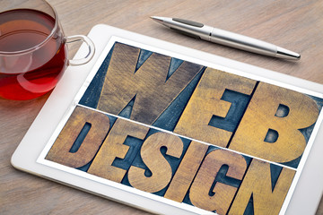 Wall Mural - web design word abstract on a digital tablet