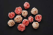 Pink Fake Rosess Black Background. Lot Of Artificial Pink Peach Flowers Copy Space