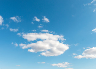 beautiful fluffy clouds against a blue sky