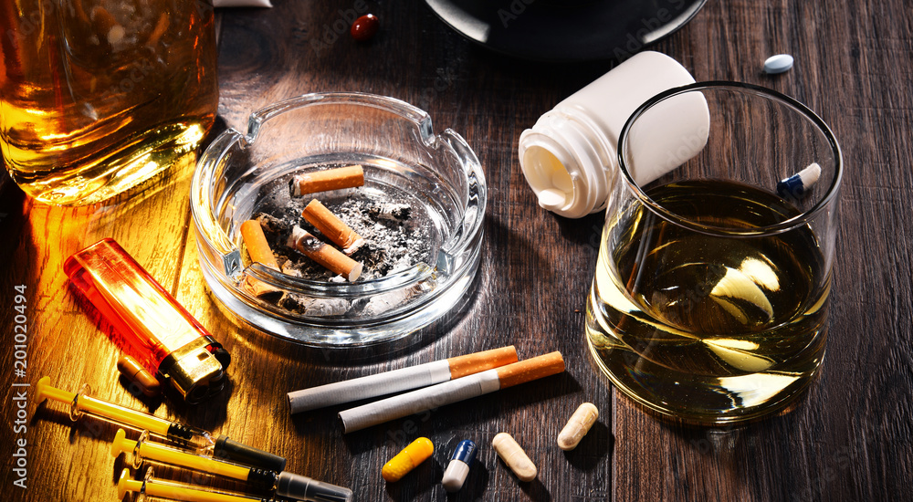 cigarettes a drug Addictive substances, including alcohol, cigarettes and drugs Stock Photo