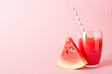 Wall Mural - Watermelon smoothie with slice of fruit and leaf of mint