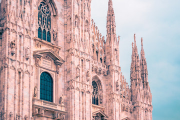 Exterior architecture of Milan Cathedral, known as Duomo di Milano, one of the largest churches in the world.