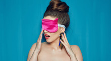 Face Portrait Of Sexy Girl Wearing Pink Eye Mask.