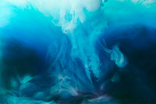 Full Frame Image Of Mixing Of Blue, Black, Turquoise And White Paints Splashes In Water