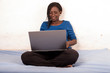 © vystekimages - portrait of young girl with laptop.