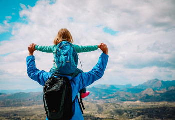 happy father with little daughter travel in nature