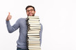 © kegfire - Satisfied student with big stack of books