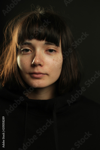Portrait Of Young Brunette With Short Hair And Bob Haircut