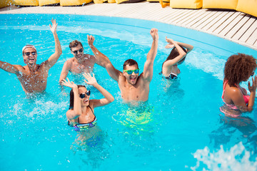 Sticker - Couples bonding cool lifestyle funky disco moves glasses tourism hotel spa teens concept. Handsome guys attractive sporty ladies standing in swimming pool raising fists celebrating event