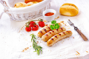 Wall Mural - delicious bratwurst with ketchup and fresh rolls