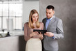 © Syda Productions - business people, technology and corporate concept - businesswoman and businessman with tablet pc computer at office