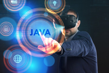 Canvas Print - Business, Technology, Internet and network concept. Young businessman working in virtual reality glasses sees the inscription: Java