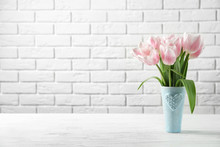 Vase With Beautiful Tulips For Mother's Day On Table