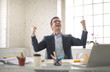 © merla - Successful business man exulting in his office
