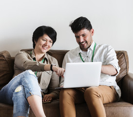 Wall Mural - Couple working on laptop