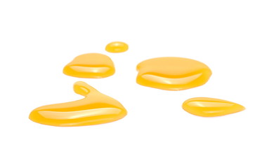 Puddle of orange juice isolated on white background, clipping path