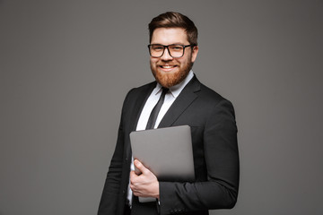 Poster - Portrait of a happy young businessman