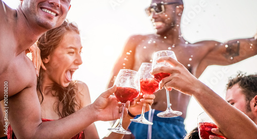 Cuadros en Lienzo Happy friends drinking sangria wine at exclusive boat party