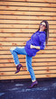 © jozzeppe777 - Fashion woman in sunglasses posing near wooden background. Summer time