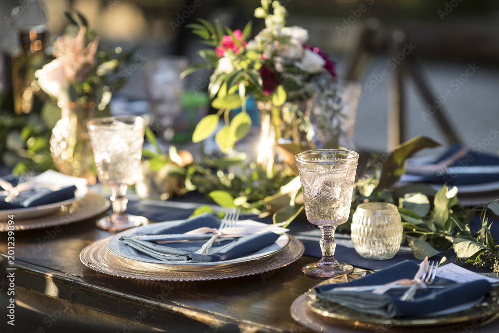 Vintage table setup for outdoor wedding reception. - obrazy, fototapety, plakaty 