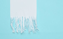 Shredded Paper Strips On A Blue Pastel Background. Minimalist Trend. Top View..