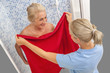 © JPC-PROD - Care giver or nurse assisting elderly woman to get out of shower