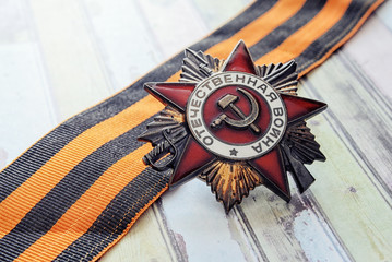 On a table award Patriotic war and St.George's Ribbon.