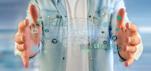 Man holding a 3d rendering artificial intelligence concept with a brain and app