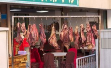 Meat For Slaughter Hanging On The Street (Kunming, Yunnan, China)