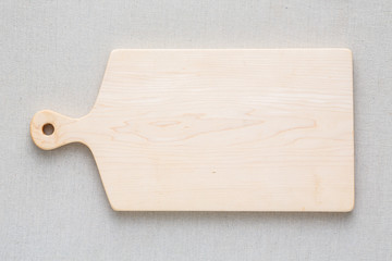 Canvas Print - Maple handmade wood cutting board on the linen