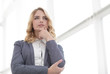 © ASDF - modern woman looking at copy space.i