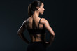 © LIGHTFIELD STUDIOS - back view of beautiful bodybuilder with muscular body in sportswear,  isolated on grey