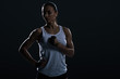 © LIGHTFIELD STUDIOS - beautiful strong sportswoman posing in sportswear, isolated on black