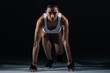 © LIGHTFIELD STUDIOS - beautiful athletic woman ready to run, on black
