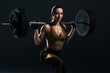 © LIGHTFIELD STUDIOS - beautiful young sexy bodybuilder squating with barbell, isolated on grey
