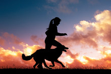 Girl Runs With Dog At Sunset