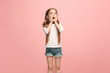 © master1305 - Beautiful teen girl looking suprised isolated on pink